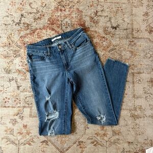 Levi’s 711 skinny ripped jeans